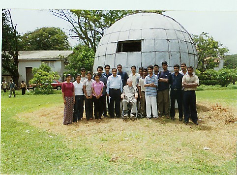 A picture of the observatory dome and the members of the Executive Committee of the Mathematical and Astronomical Society